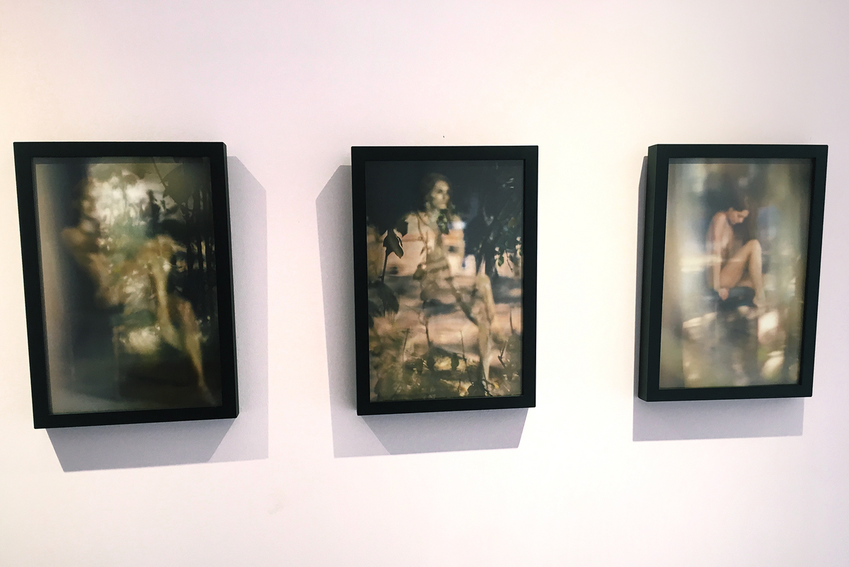 Three framed figurative photographs by Zack Zublena displayed at the Emmanuelle Blanche beauty salon in Beverly Hills.