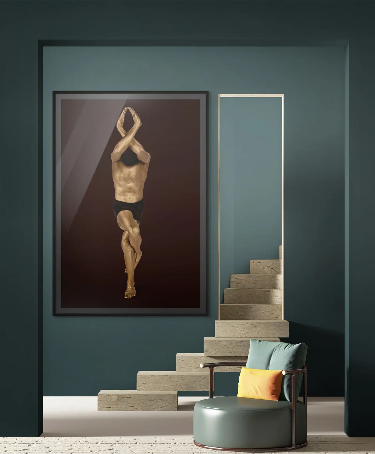 Gold-painted figure with arms raised overhead on a dark background, large framed fine art print by Zack Zublena in a modern teal interior with a stone staircase