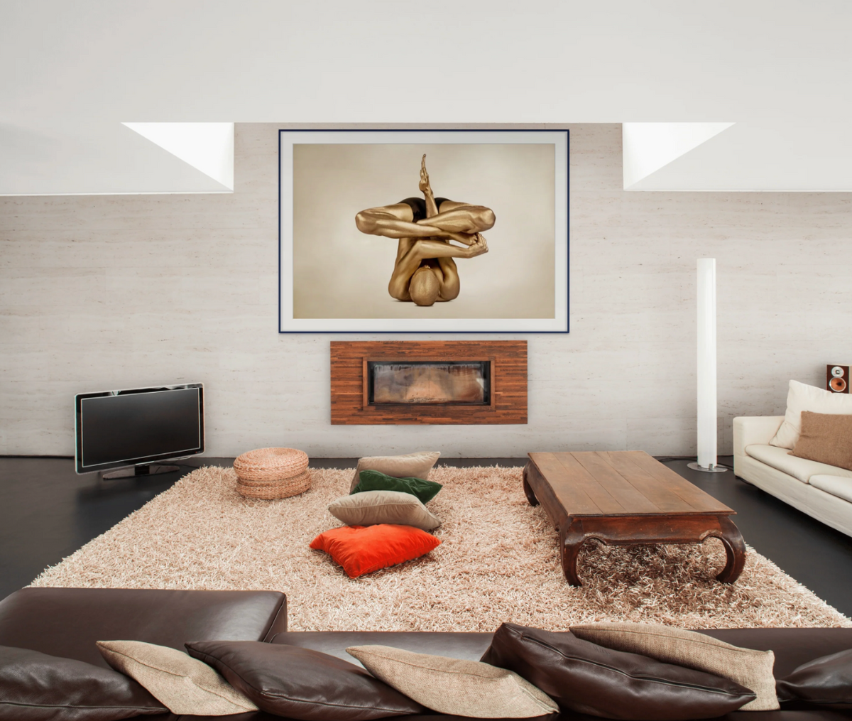 Headless gold-painted yogi in an inverted sculptural pose, photographed by Zack Zublena for luxury wellness interiors.