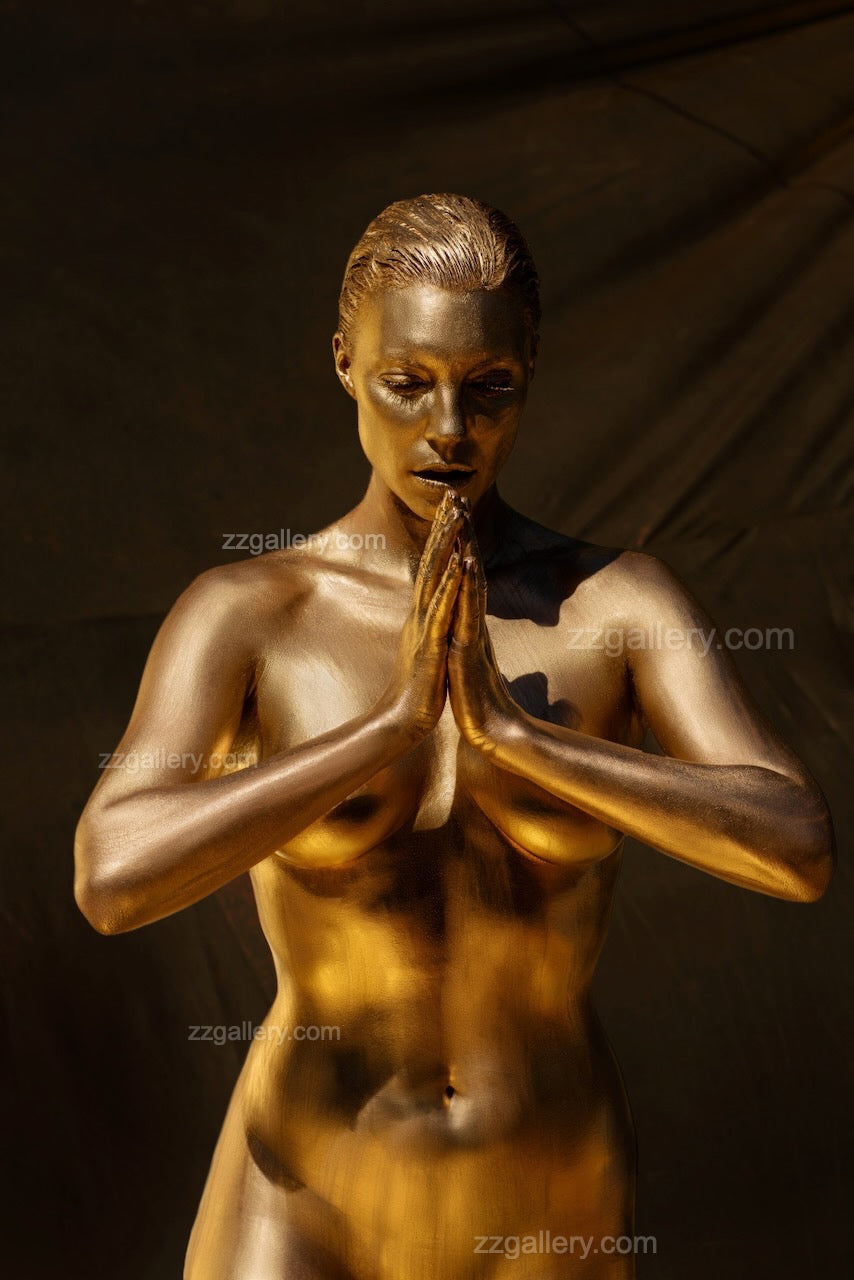 Golden Silence fine art photograph by Zack Zublena displayed as large golden wall art in a modern living room with neutral décor.