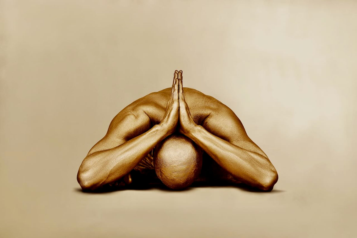 Golden Dome fine art photography by Zack Zublena featuring a gold painted body in a meditative prayer pose