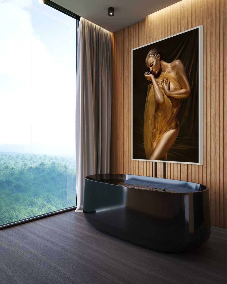 Golden goddess artwork of a female figure draped in shimmering gold fabric, radiating elegance and divine beauty in fine art wall decor by Zack Zublena.
