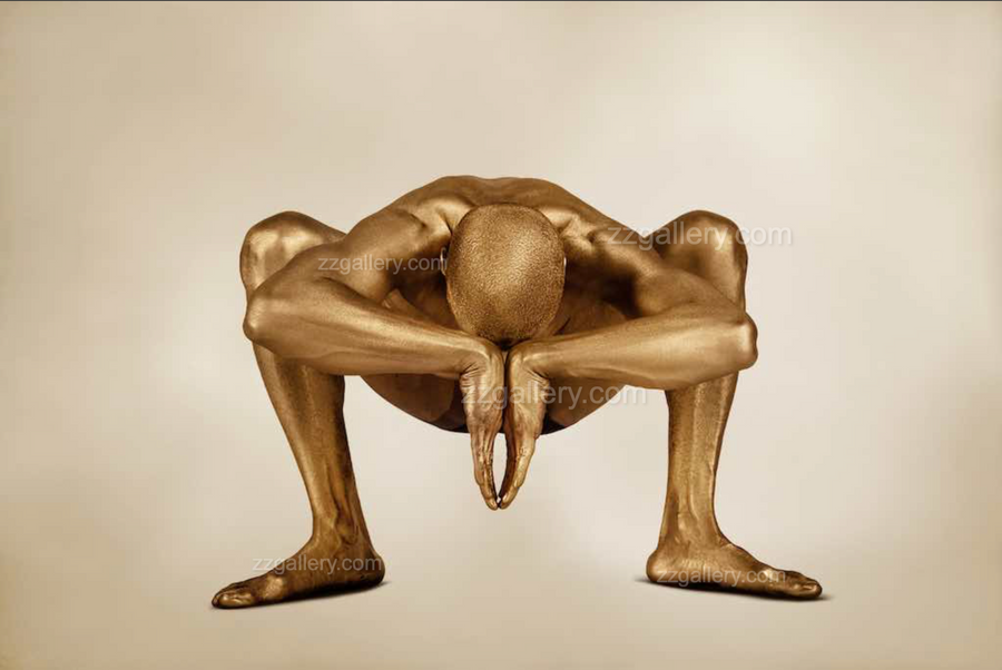 Golden-painted male figure in a deep yoga squat with hands joined in front, captured as fine art wall decor. Symbolizes strength, grounding, meditation, and spiritual energy—ideal for yoga studios, meditation rooms, wellness spaces, and luxury interiors.