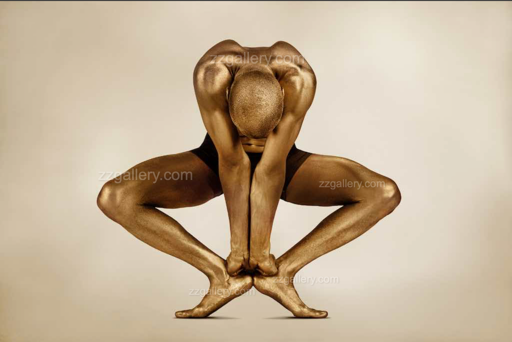 Golden yogi squat pose wall art – luxury fine art yoga photography print with crossed hands