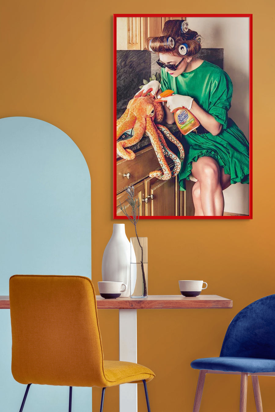 Surreal pop art fine art photograph of a glamorous housewife in green dress and curlers cleaning an octopus with household spray, blending humor, absurdity, and contemporary surrealism for playful wall art décor.