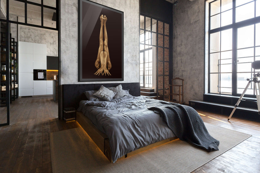 Gold-painted figure in an inverted pose, contemporary fine art wall photography by Zack Zublena with a focus on balance and form.