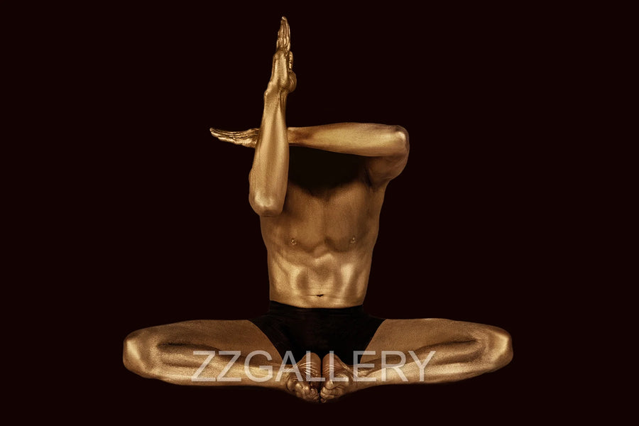 Golden-painted male figure in a seated meditation pose with arms raised, symbolizing ego dissolution and the vacuum state. Contemporary conceptual fine art by Zack Zublena.
