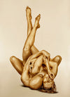 Golden nude couple entwined in a sculptural, sacred pose with elevated legs and sensual expression