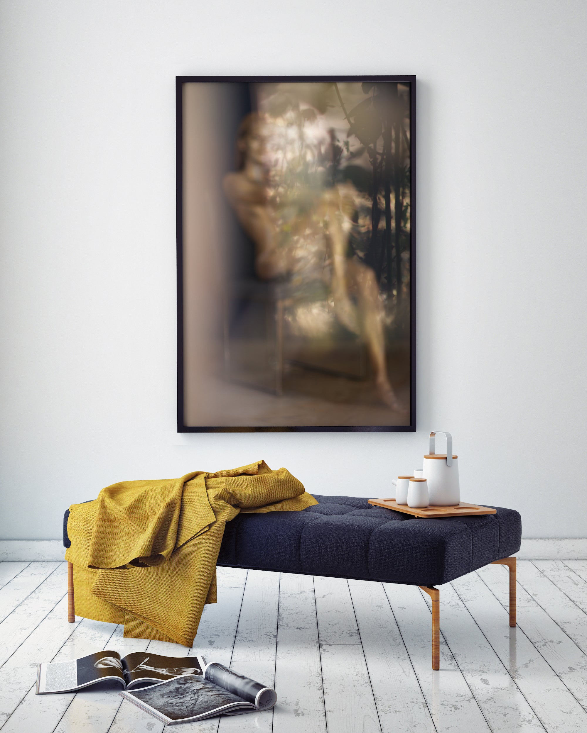 Golden-painted nude woman in a blurred artistic portrait, displayed as luxury fine art wall decor above a modern bench with yellow throw.