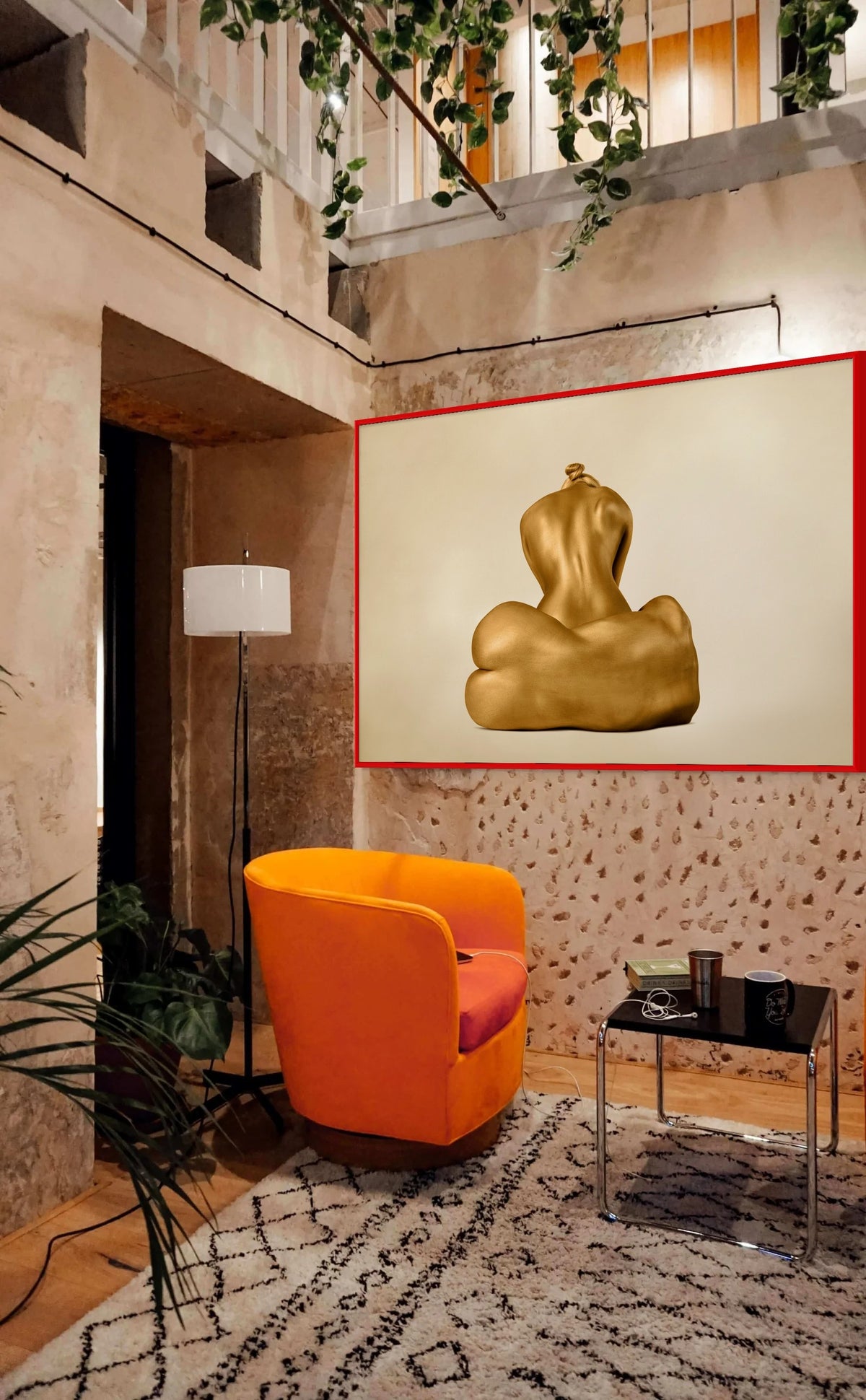 Golden-painted feminine figure captured in a sculptural pose, symbolizing beauty, elegance, strength, and divine feminine energy in contemporary fine art photography by Zack Zublena.