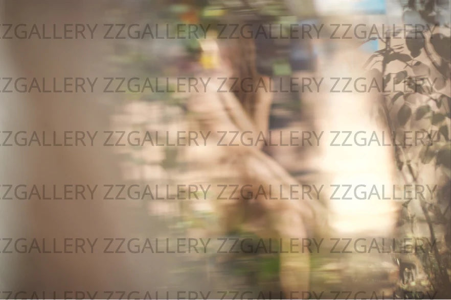 Blurry nude feminine figure in nature, soft abstract fine art photography, ethereal wall decor for luxury hotels, spas, and meditation rooms.