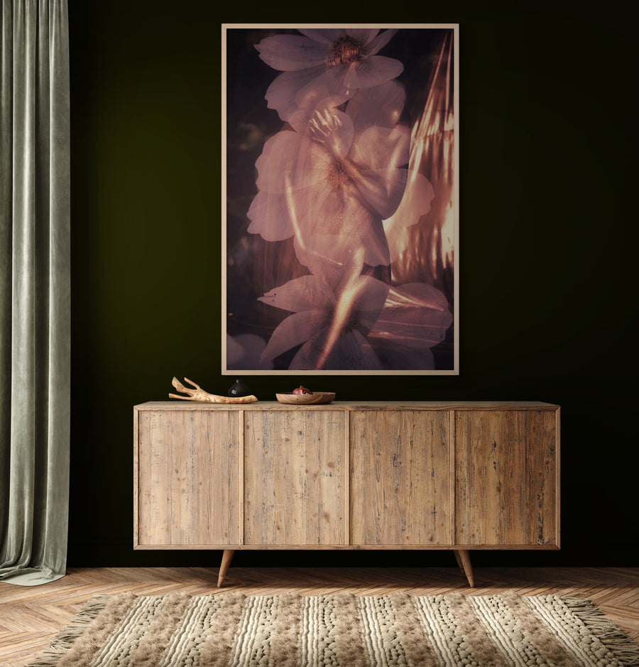 Golden-painted nude female figure emerging through soft jasmine petals, blending sensuality and floral elegance in fine art photography — perfect for interiors, collectors, and wellness spaces.