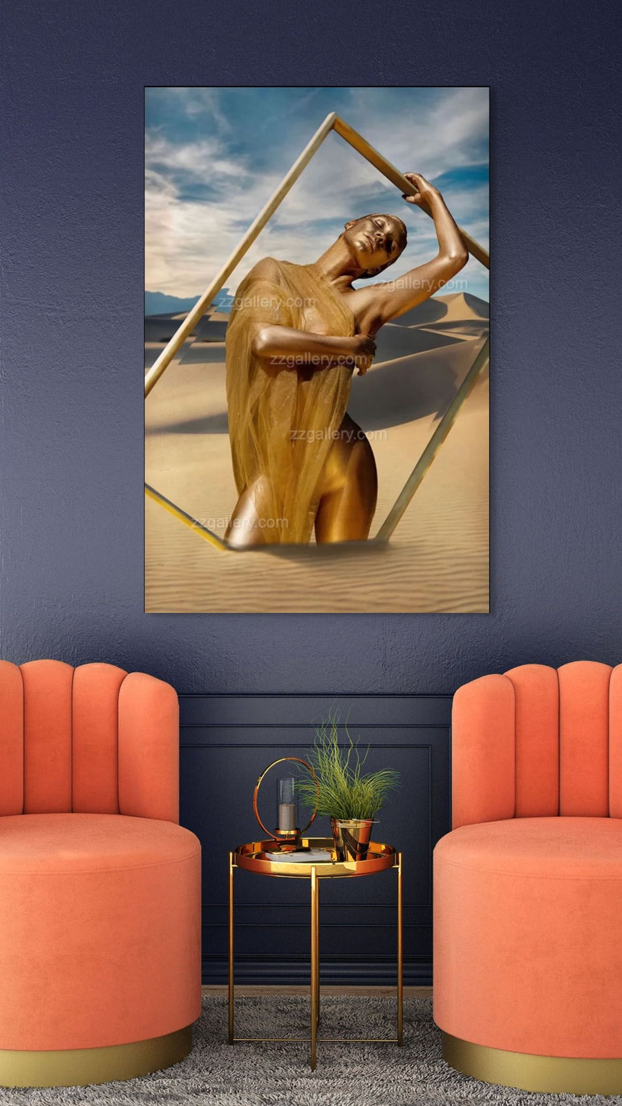 Golden-painted feminine figure draped in translucent golden fabric, posing in a desert landscape with a modern geometric frame — fine art wall photography.