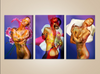 Floral golden nude trio wall art – fine art photography blending golden-painted female forms with vivid flowers for luxury interiors and collectors.