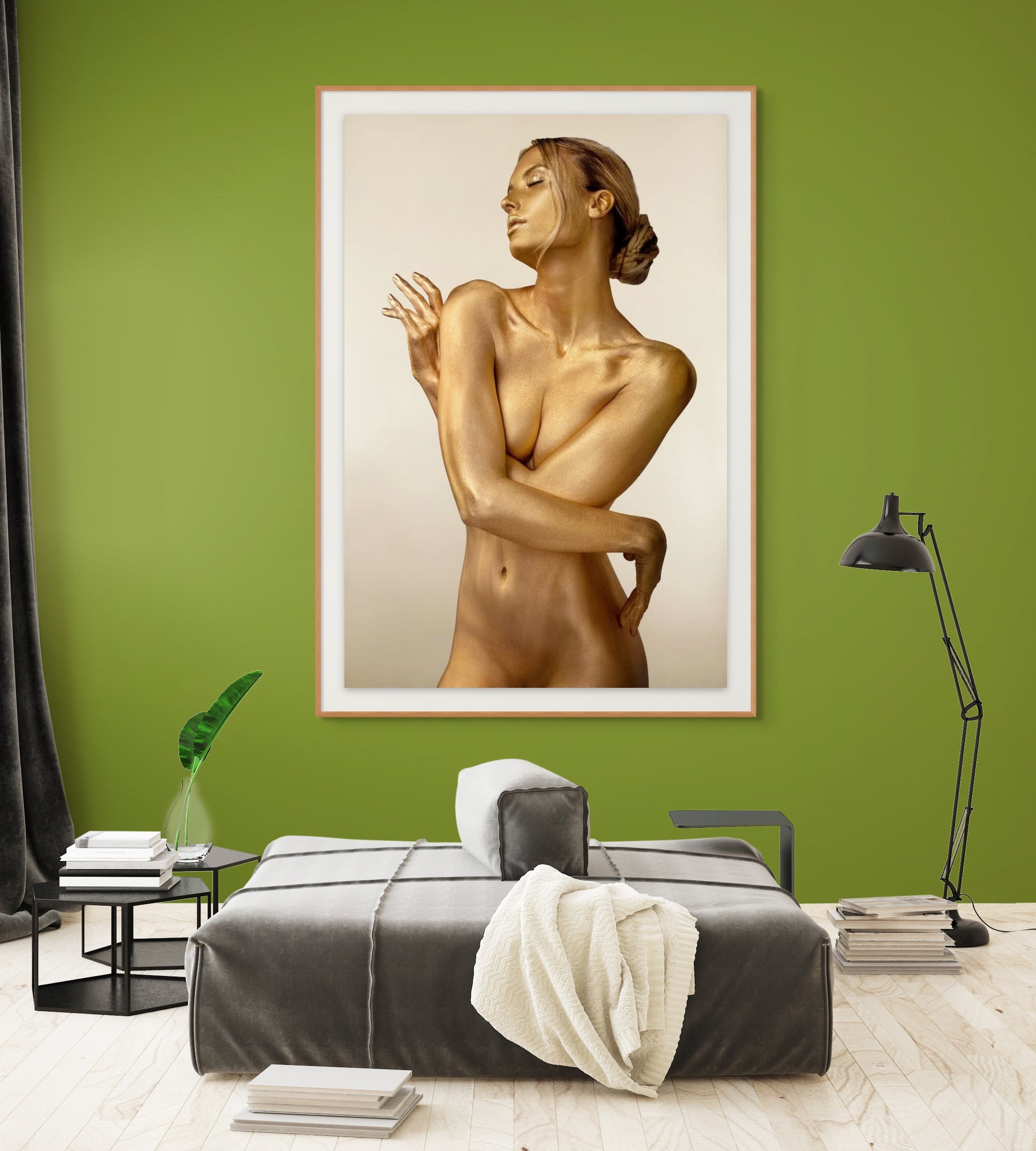 Golden figure fine art photograph titled 'Gazelle Guess,' depicting a graceful female form in shimmering gold tones, captured in an elegant pose. Modern gold wall art decor for luxury interiors and collectors.