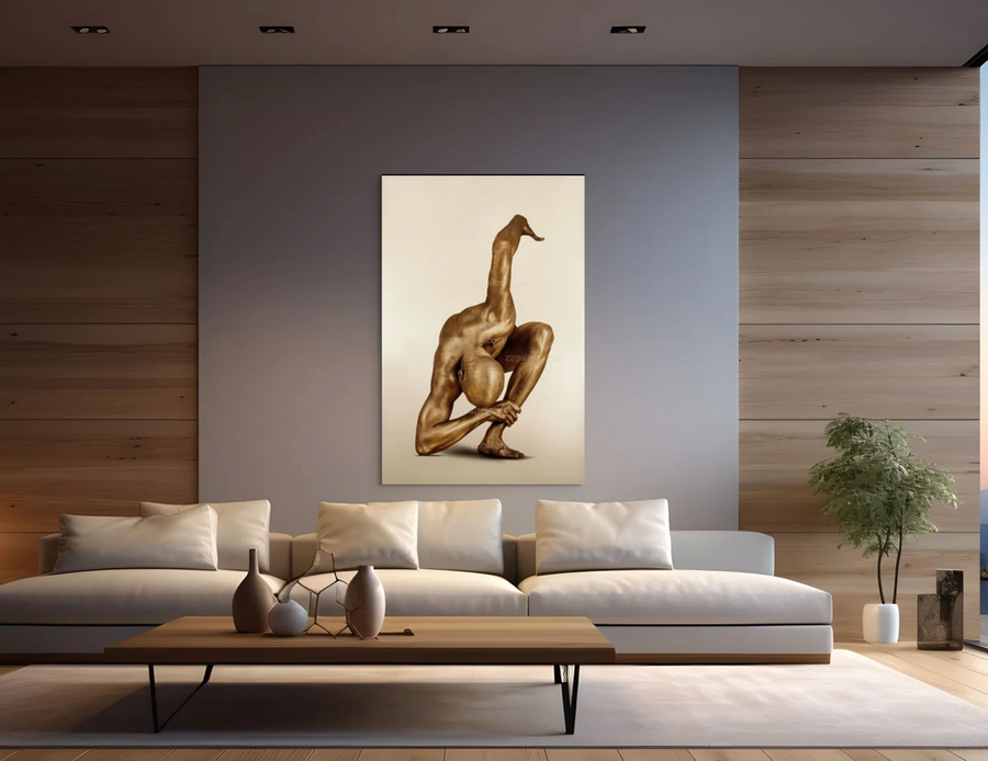 Golden-painted male figure in a dramatic sculptural yoga pose, balancing with one leg raised and arms intertwined, captured as fine art photography. This powerful gold body artwork symbolizes strength, resilience, and modern spiritual expression, making it ideal for luxury interiors, yoga spaces, and contemporary art collectors.