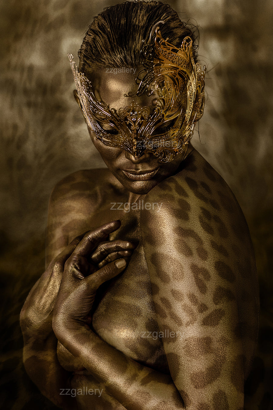 African goddess golden nude fine art photograph, body painted with leopard patterns and adorned with a mystical mask, symbolizing divine feminine power, feline spirit, and primal transformation.