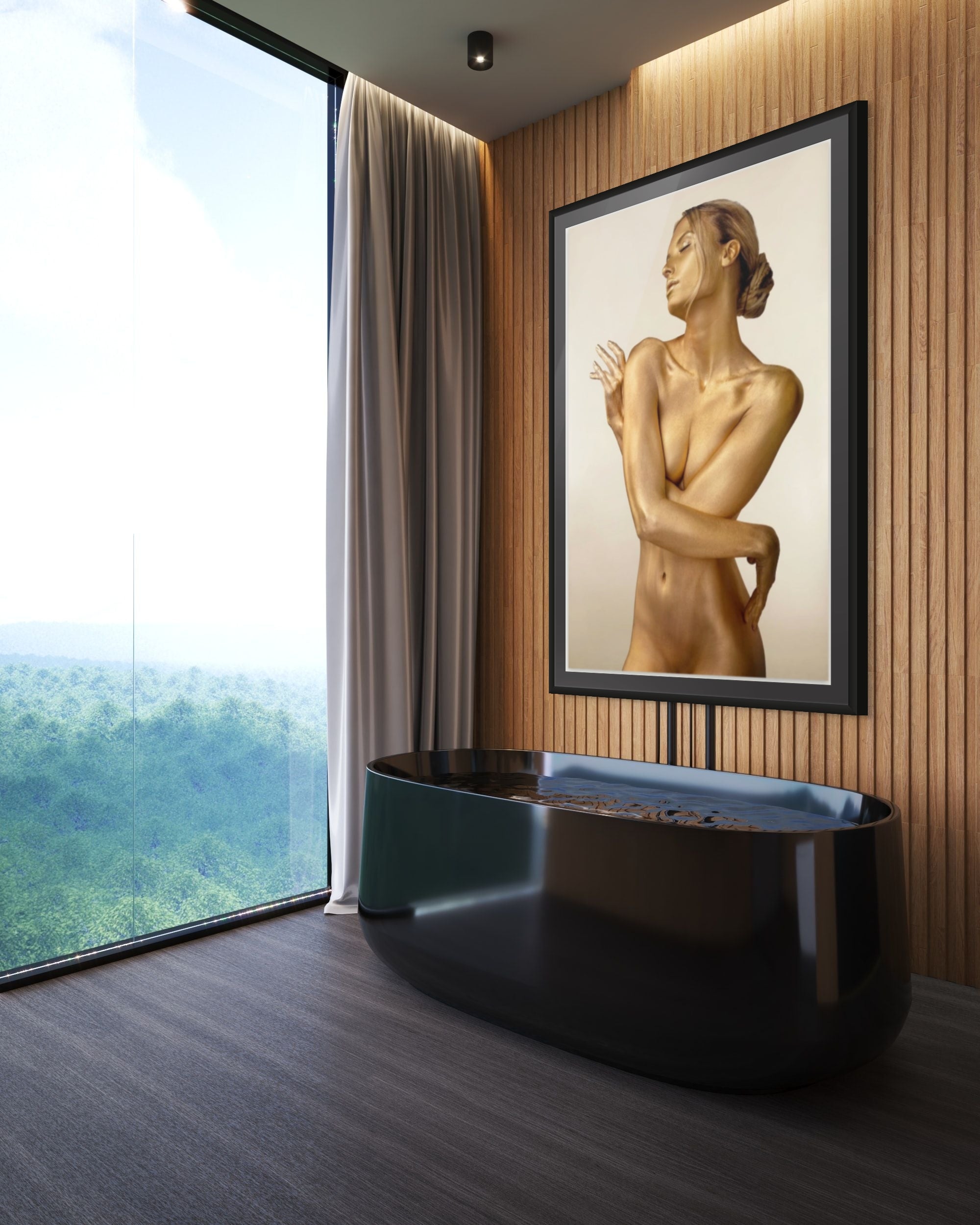 Luxury gold fine art wall print of a feminine portrait displayed in a modern bathroom interior with wooden wall paneling, black freestanding bathtub, and large window with natural view.