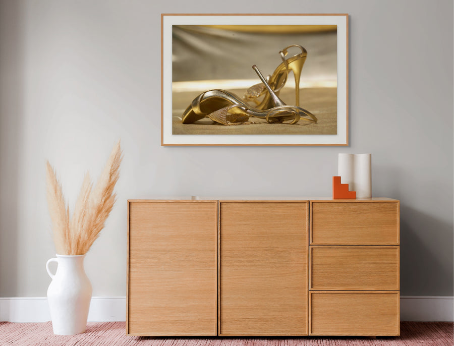 Golden high heels fine art photograph symbolizing elegance, passion, and sensual luxury, perfect for contemporary wall decor in stylish interiors.
