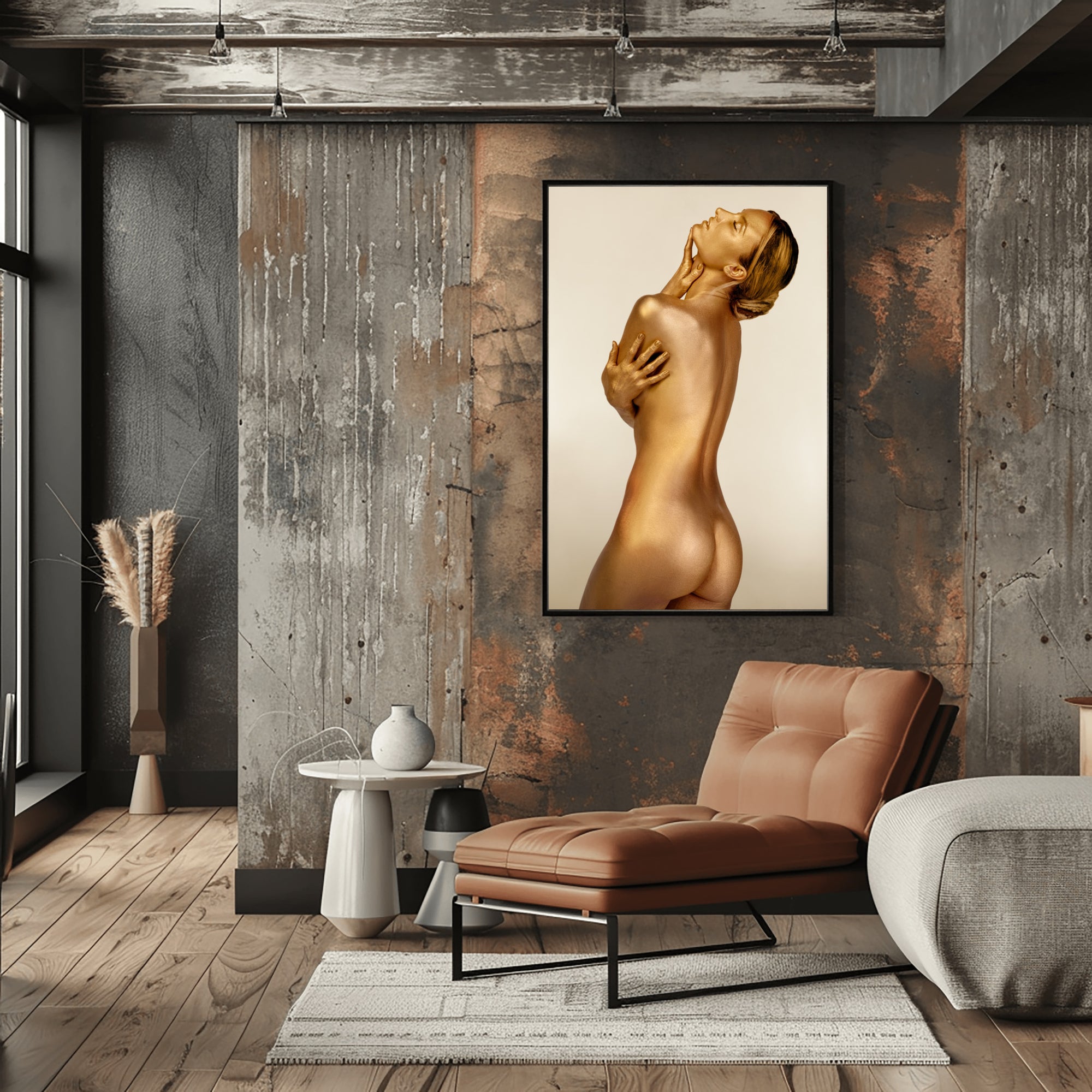 Golden figure wall art displayed in an industrial chic interior with exposed brick, warm tones, and a leather lounge chair.