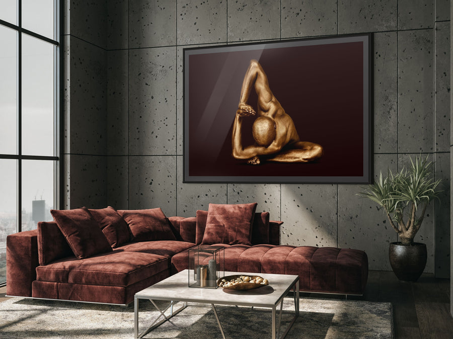 Gold-painted male figure in a deep side stretch pose, arms extended gracefully, displayed against a dark background. Contemporary fine art wall photography by Zack Zublena.