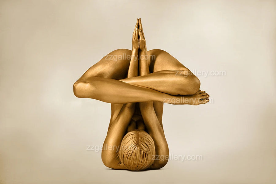 Golden nude in intricate yoga coil with prayer hands, sculptural spiritual fine art wall decor.
