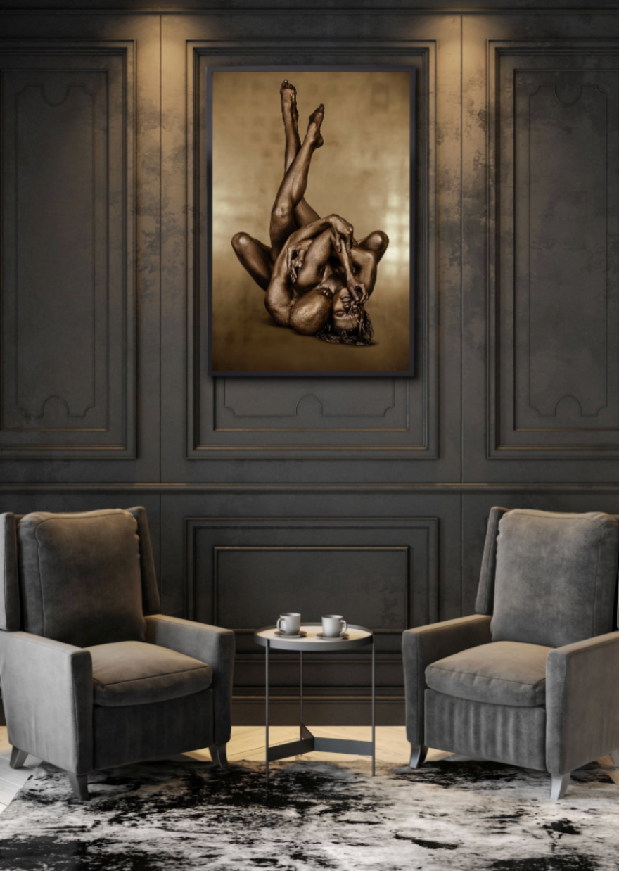 Golden-painted couple entwined in sculptural yoga embrace, luxury fine art photography for hotels, spas, collectors, and contemporary interiors