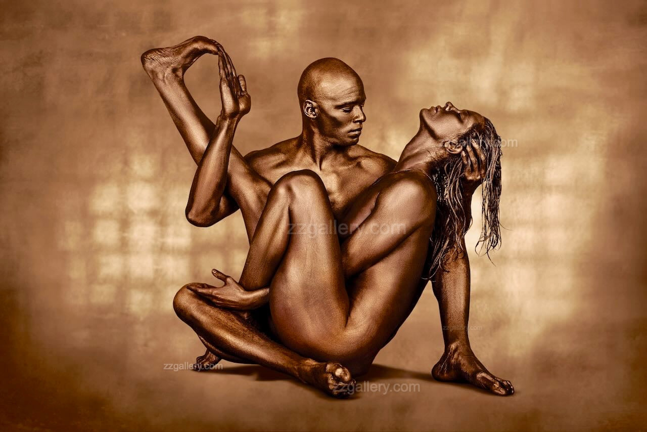 golden-couple-fine-art-union
Golden-painted man and woman in a yoga-inspired union pose, luxury fine art photography for hotels, spas, and collectors.