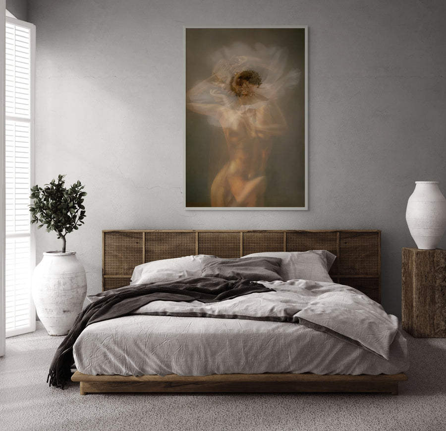Golden ethereal nude figure dissolving into soft white light, blending human form with abstract spiritual energy in a surreal fine art composition.