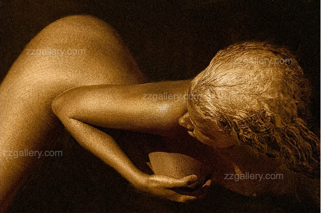 Golden female figure in elegant curved pose, luxury fine art wall decor with timeless gold tones.