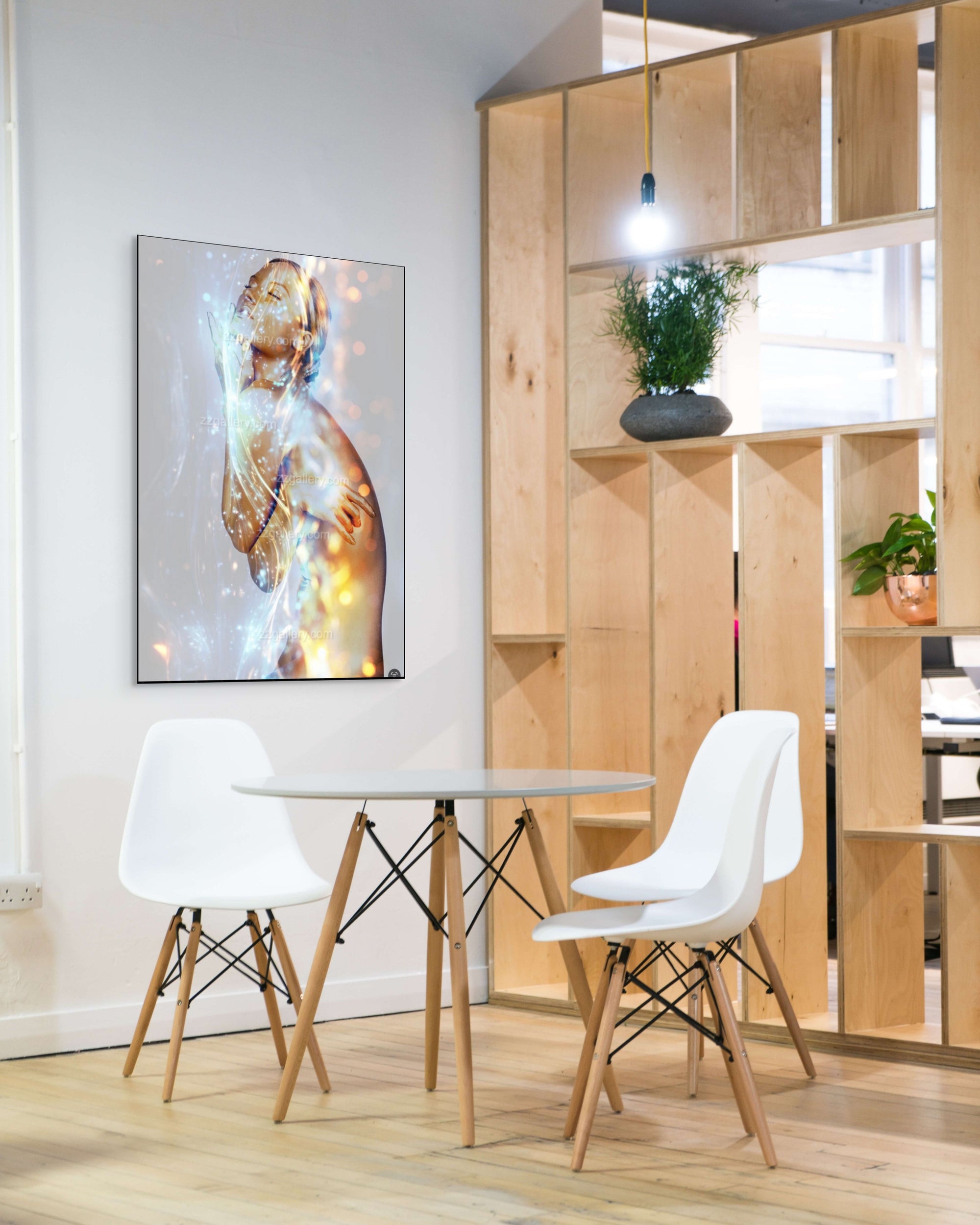 Golden female figure illuminated by glowing light – fine art photography by Zack Zublena, luxury feminine wall art for modern interiors.