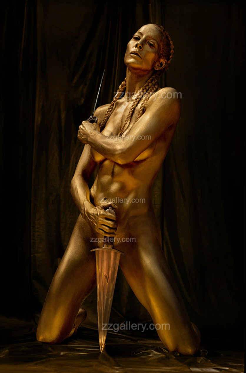 Golden-painted nude female warrior kneeling with a ceremonial sword, fine art wall decor symbolizing strength and sacred feminine energy.