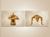Golden yoga prayer diptych wall art showing gold-painted figure in prayer inversion pose, spiritual meditation photography for yoga and wellness interiors.