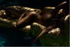 Golden figure on gold float, luxury fine art photography, graceful feminine wall art, elegant artistic wall decor.