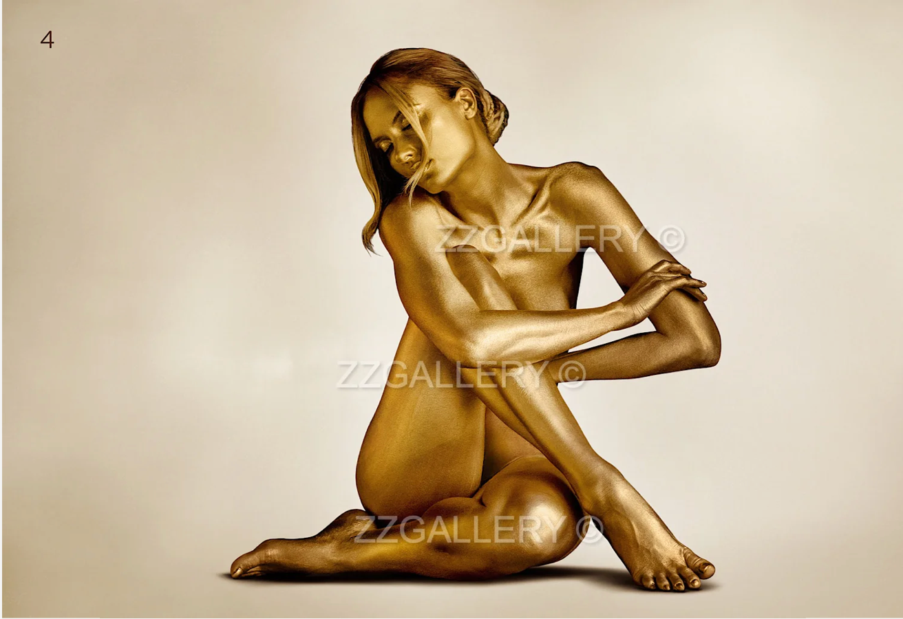 Golden figure sitting gracefully in serenity, luxury fine art photography for interiors, spas, and collectors.