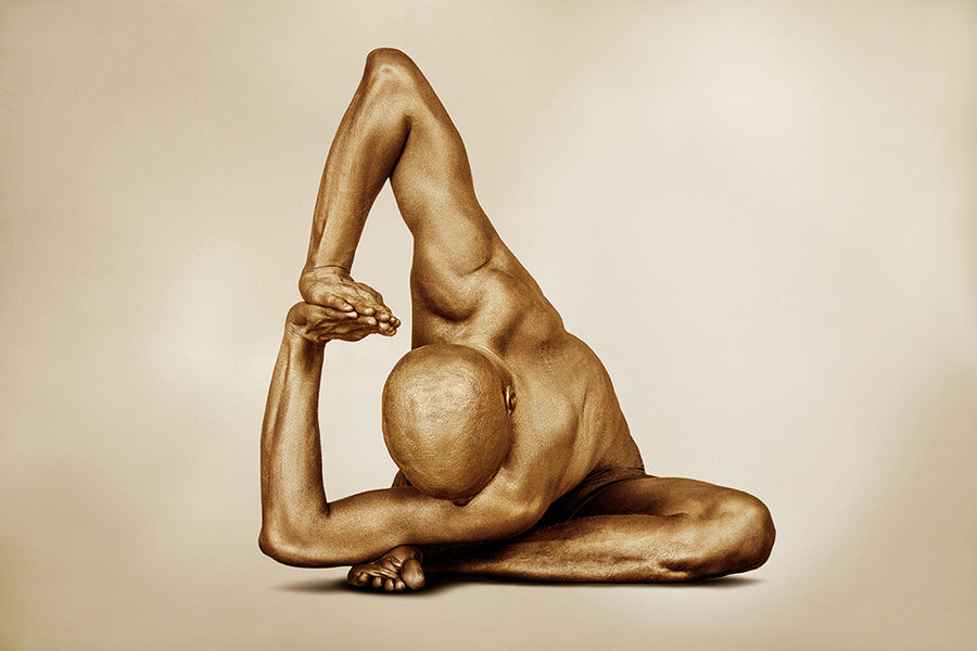 Golden-painted male figure in a deep yoga pose, symbolizing strength, flexibility, and mindfulness — fine art wall decor for meditation rooms, yoga studios, wellness spaces, and luxury contemporary interiors.