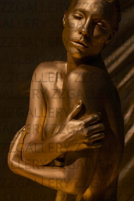 Golden goddess fine art portrait of a woman in gold body paint – luxury spiritual nude photography by Zack Zublena for collectors, spas, and hotels.