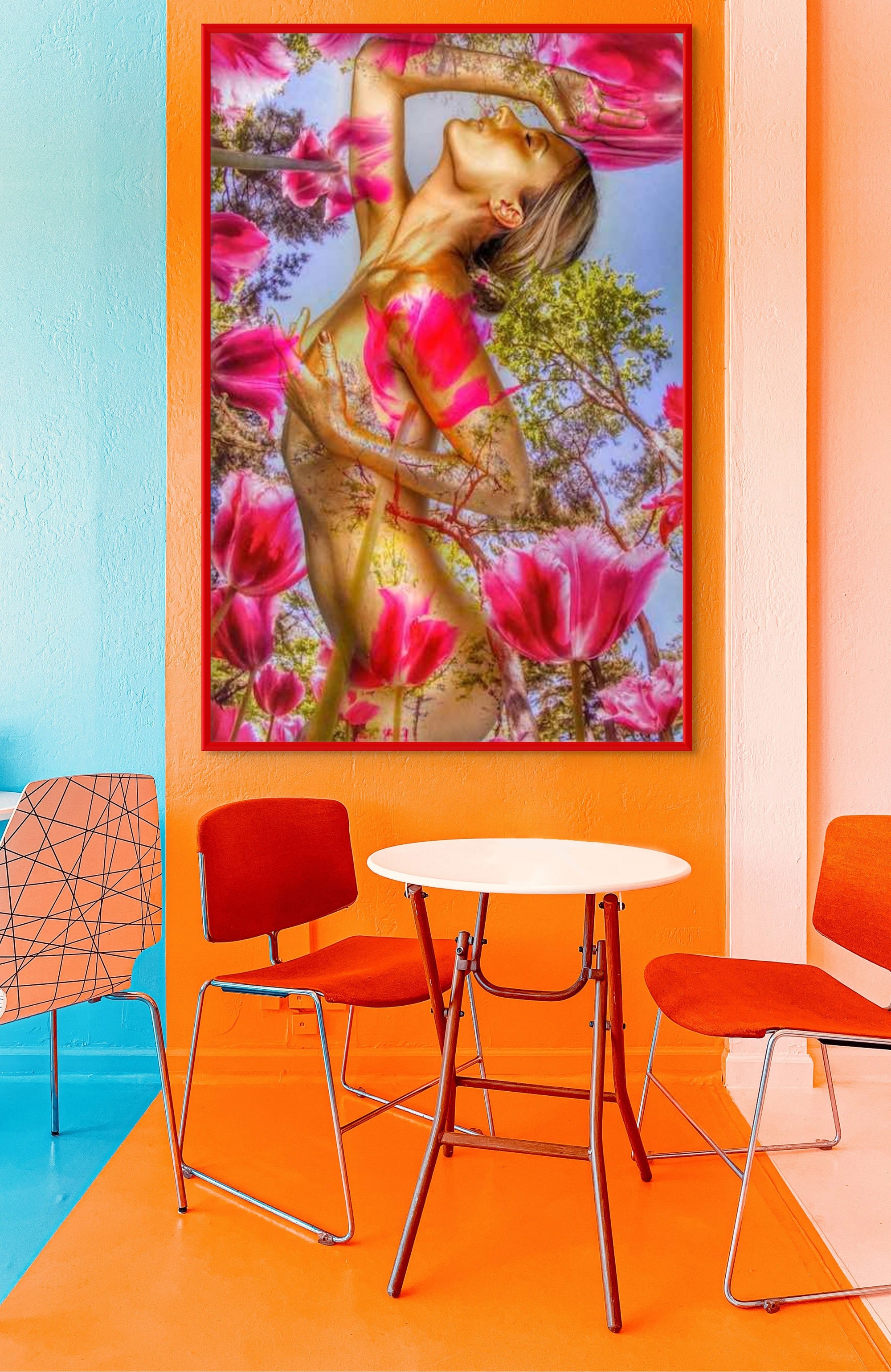 Golden-painted nude woman gracefully posing among blooming pink tulips and trees, blending sensual elegance with nature in surreal fine art photography.