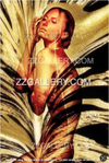 Sensual woman in golden light fine art nude photography with shadow play