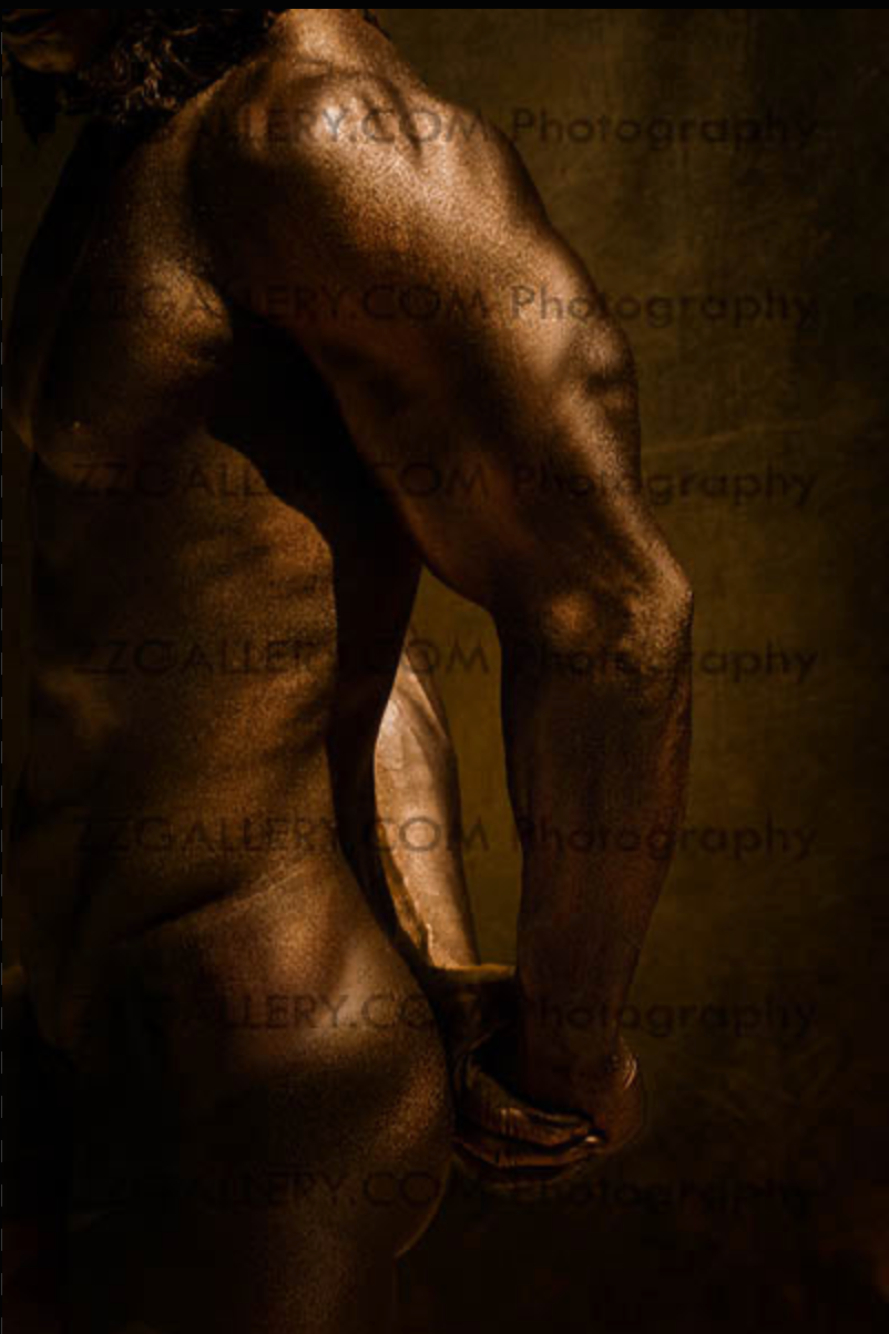 Golden-painted male torso fine art photograph by Zack Zublena — muscular body wall art with sculptural detail.