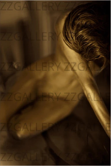 Golden female nude fine art red hair portrait by Zack Zublena – luxury spiritual photography of masculine form in gold body paint for collectors and designers.