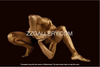Golden male nude yoga pose fine art photography on a dark background – luxury gold wall art for meditation, wellness, and contemporary art collectors.