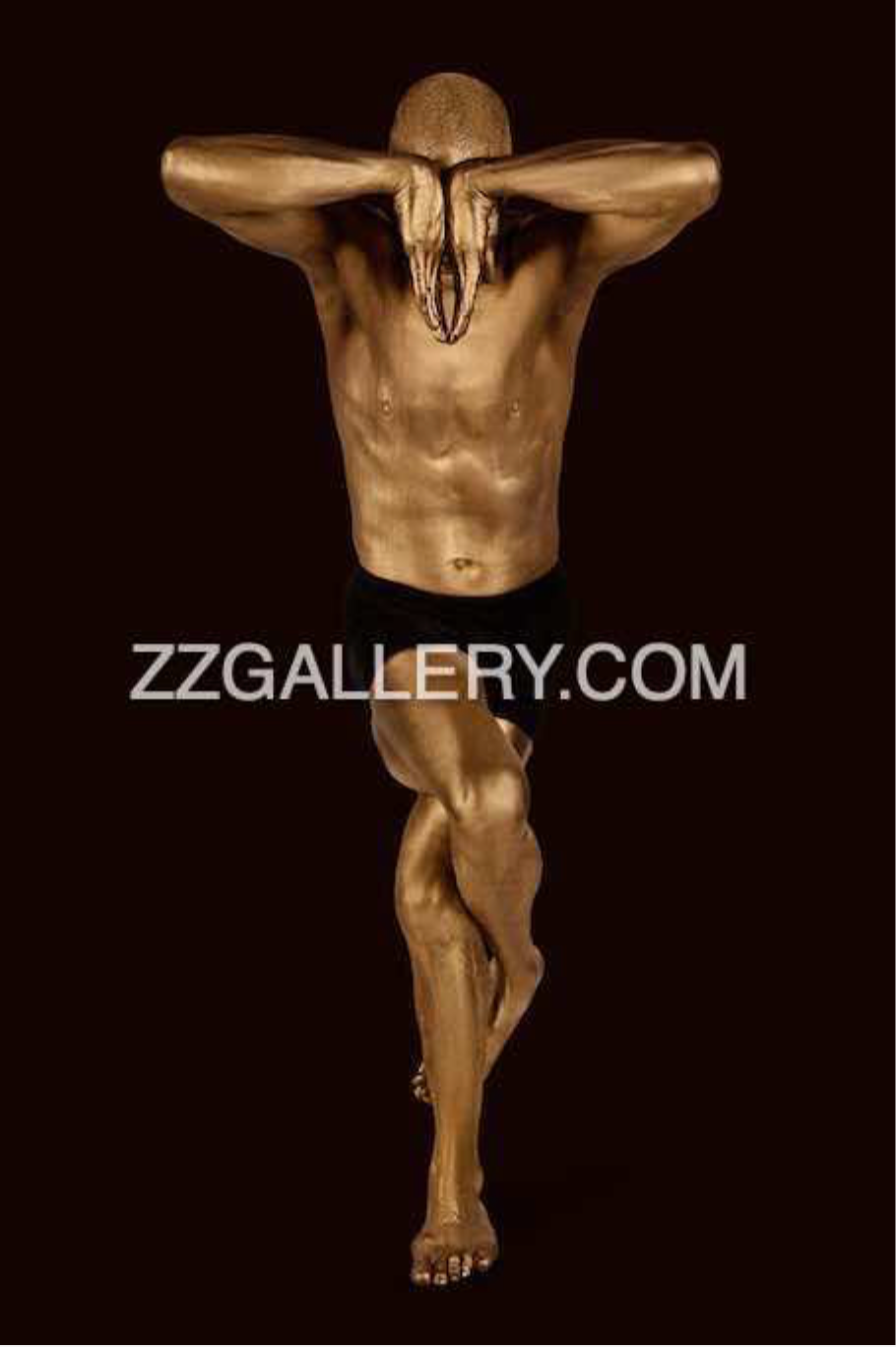 Golden male nude yoga pose on dark background – luxury fine art photography for wellness spaces, meditation rooms, spas, and contemporary wall decor