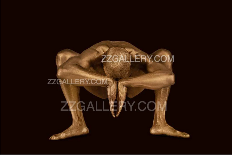 Golden male nude yoga squat with prayer hands – luxury fine art photography for meditation, yoga studios, wellness interiors, and contemporary wall decor.