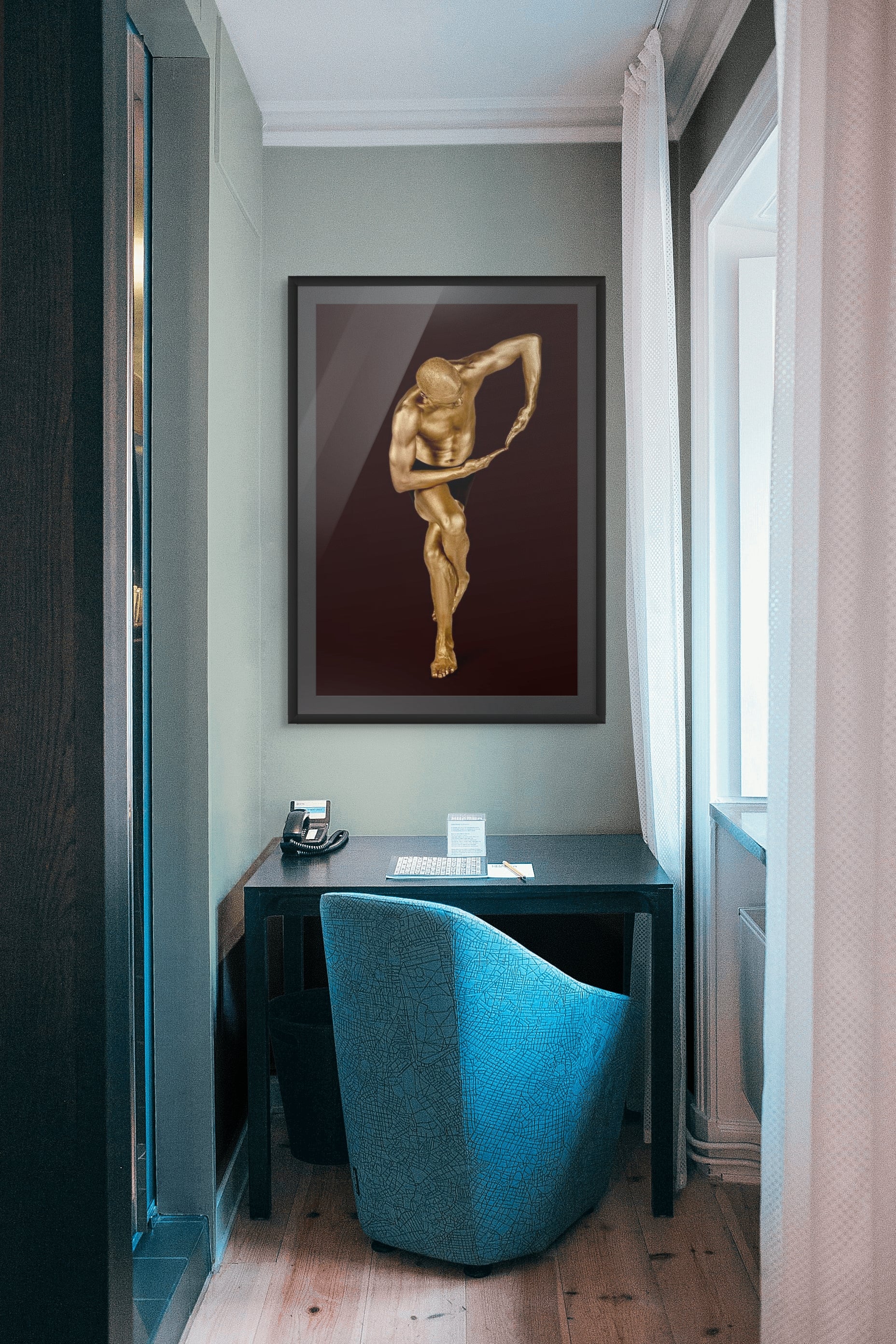 Golden male figure in a sculptural standing pose with arm curved inward – luxury fine art photography for modern interiors, spas, hotels, and collectors.