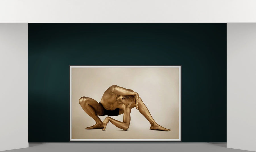 Fine art photograph of a golden-painted male figure in a deep yoga stretch, symbolizing flexibility, balance, and spiritual strength. Ideal wall art for yoga studios, meditation rooms, wellness centers, and luxury modern interiors.