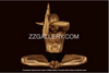 Golden male yoga eagle pose on dark background – luxury fine art nude photography for meditation rooms, yoga studios, wellness spaces, and modern wall decor.