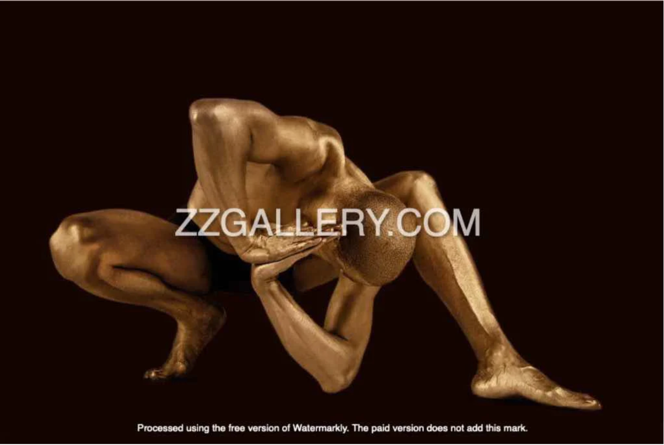Golden male yoga pose fine art photography on a dark background – luxury gold wall art for meditation, wellness, and contemporary art collectors.