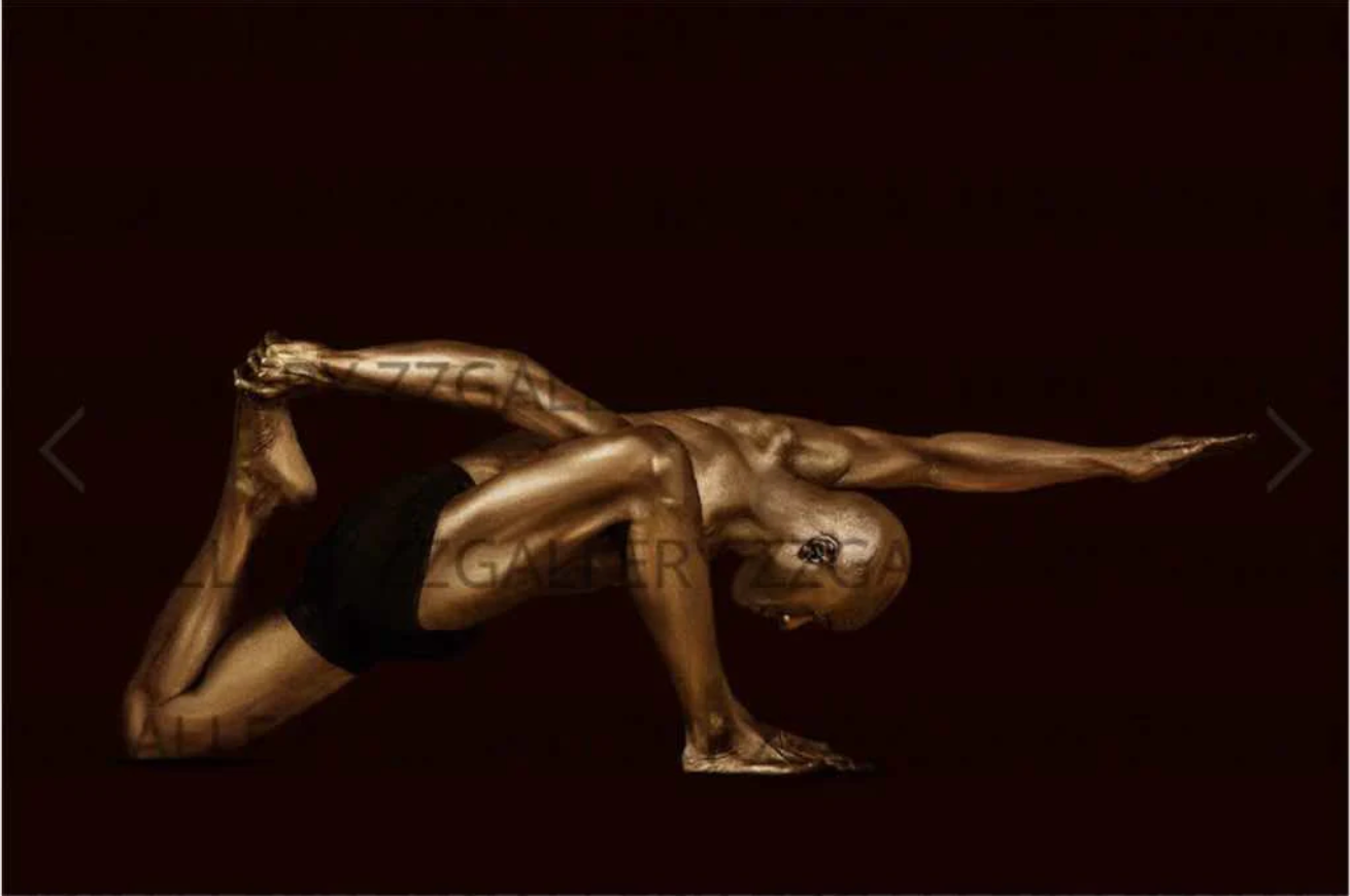 Golden male yoga stretch pose fine art photography on dark background wall art print