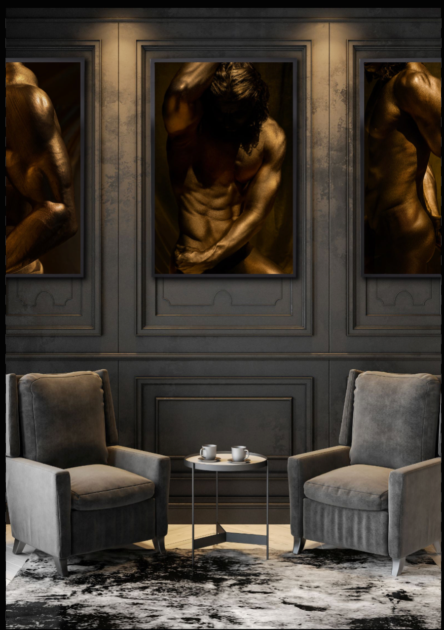 Golden masculine fine art photography by Zack Zublena displayed in a luxury interior mockup with dark wall paneling and armchairs. Elegant wall art presentation for upscale spaces.